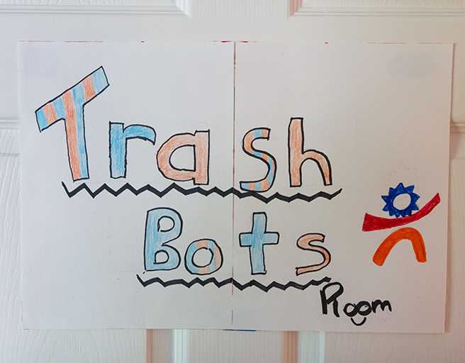 Trash bots sign on door